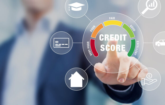 Ways to build Business Credit. In the pic a man checking credit score.