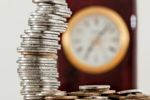 Simple budgeting techniques entrepreneur should know. There is pile of coins.